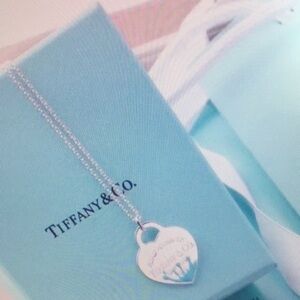 Tiffany & Co Silver Heart Tag Pendant on Tiffany Blue